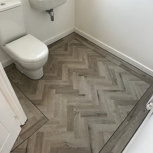 Bathroom grey LVT with black border