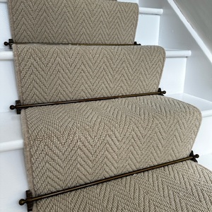 Beige carpet runner brass stair rod 