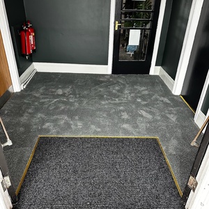 Grey entrance matting and carpet