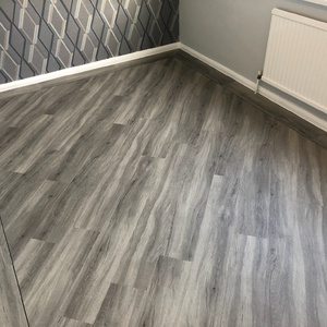 Grey LVT On The Angle With Boarder 