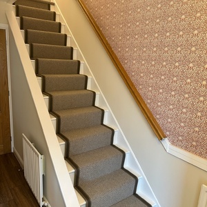 Taped beige carpet runner 
